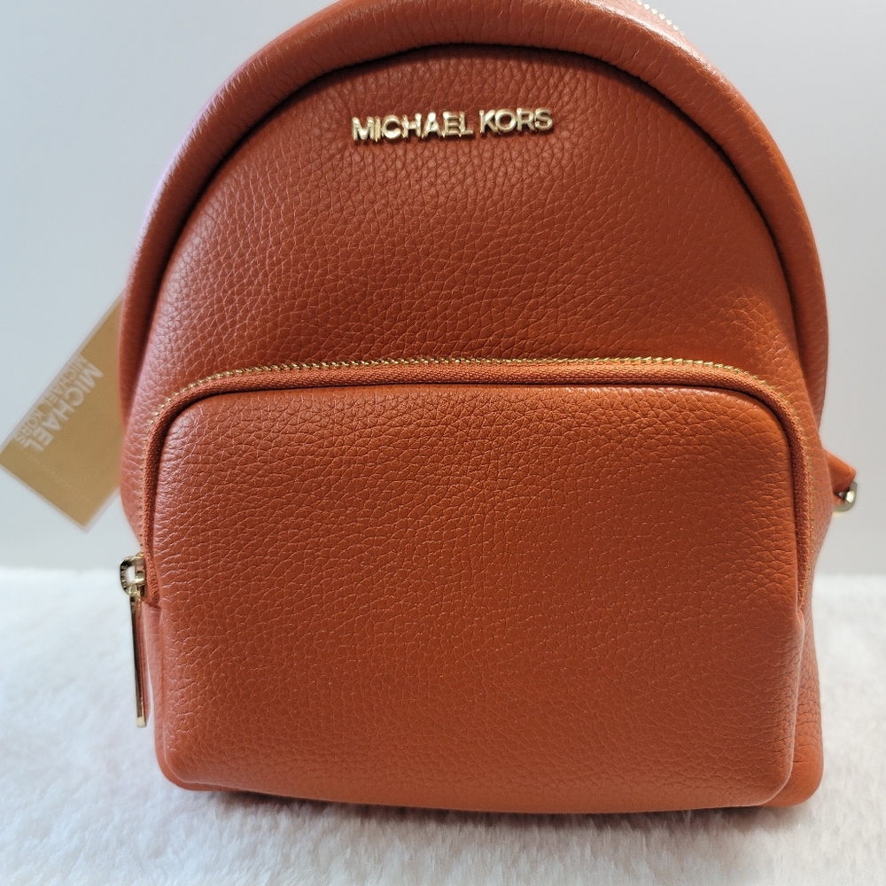 MK Erin small backpack in Tangerine